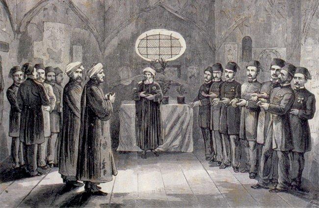 1877’de Budapeşte’de bulunan bir Osmanlı heyetinin Gülbaba Türbesi içinde Fâtiha okuyuşunu tasvir eden gravür (Erdödi Béla, “Sepulcre de Gül Baba dans la chapelle de Buda”, Le Journal du Dimanche, Paris 1873, s. 45)