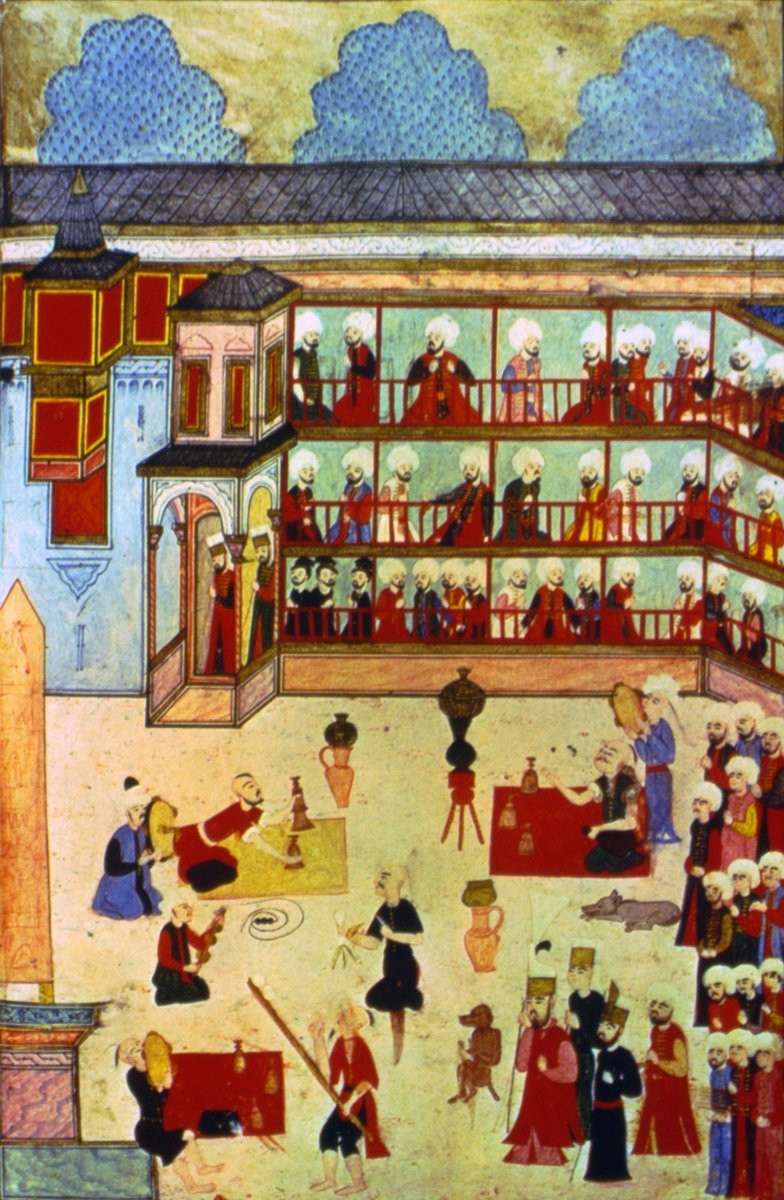 1582’de Sultan III. Murad’ın oğlu Şehzade Mehmed için düzenlenen sünnet düğünündeki hokkabazların gösterisini tasvir eden minyatür (Surnâme-i Hümâyun, TSMK, Hazine, nr. 1344, vr. 206a)